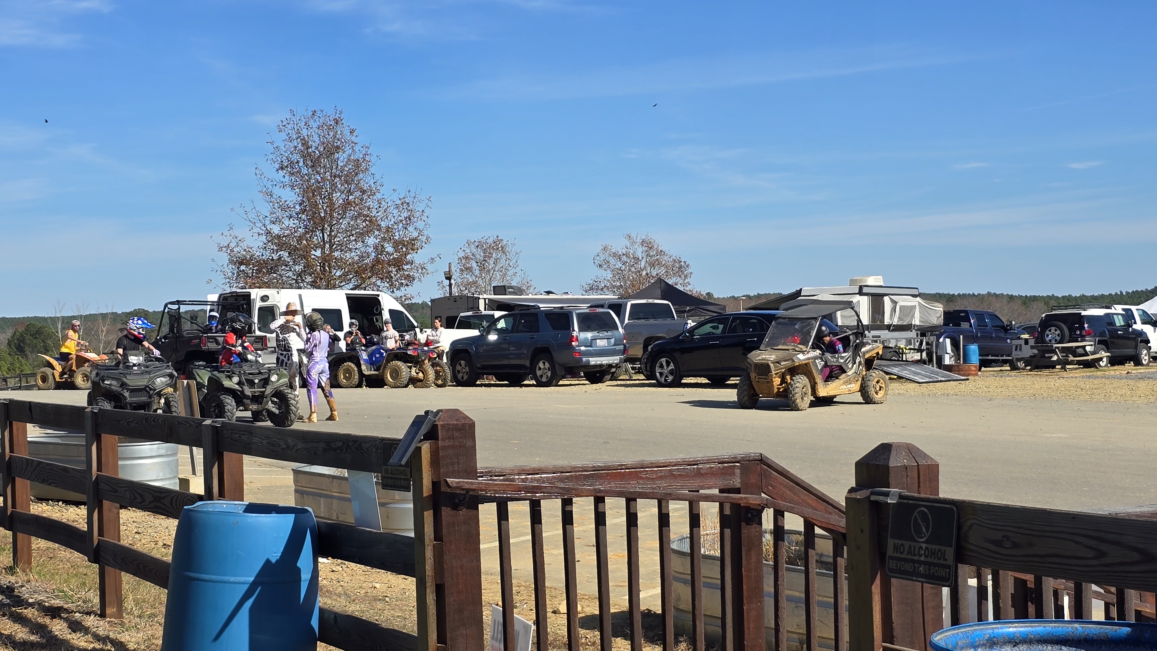 Couple posing with RZR in the forest