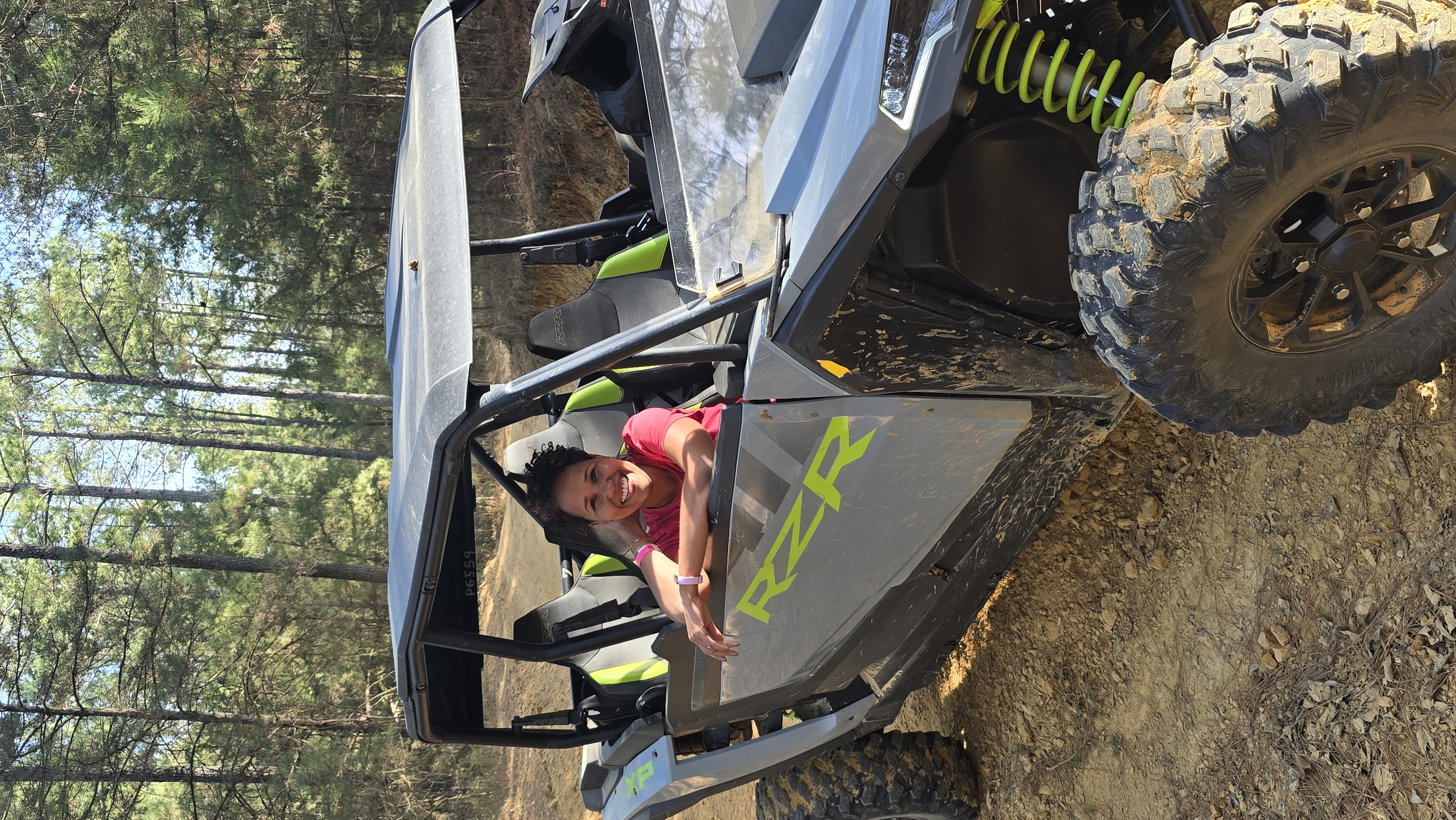 Client on RZR off-road vehicle
